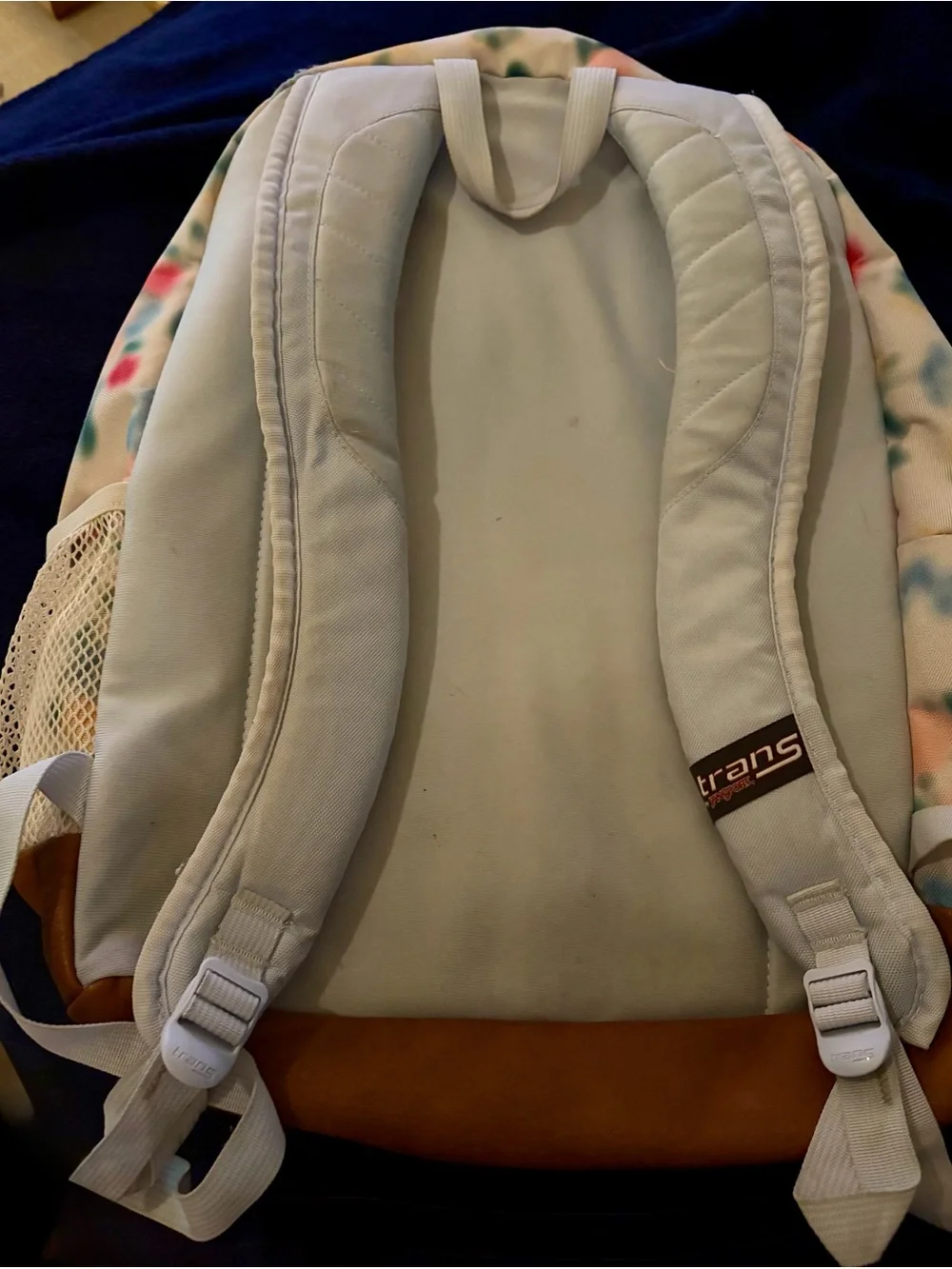 JanSport Trans Backpack in Cream with Pink, Blue, Green and Yellow Accents